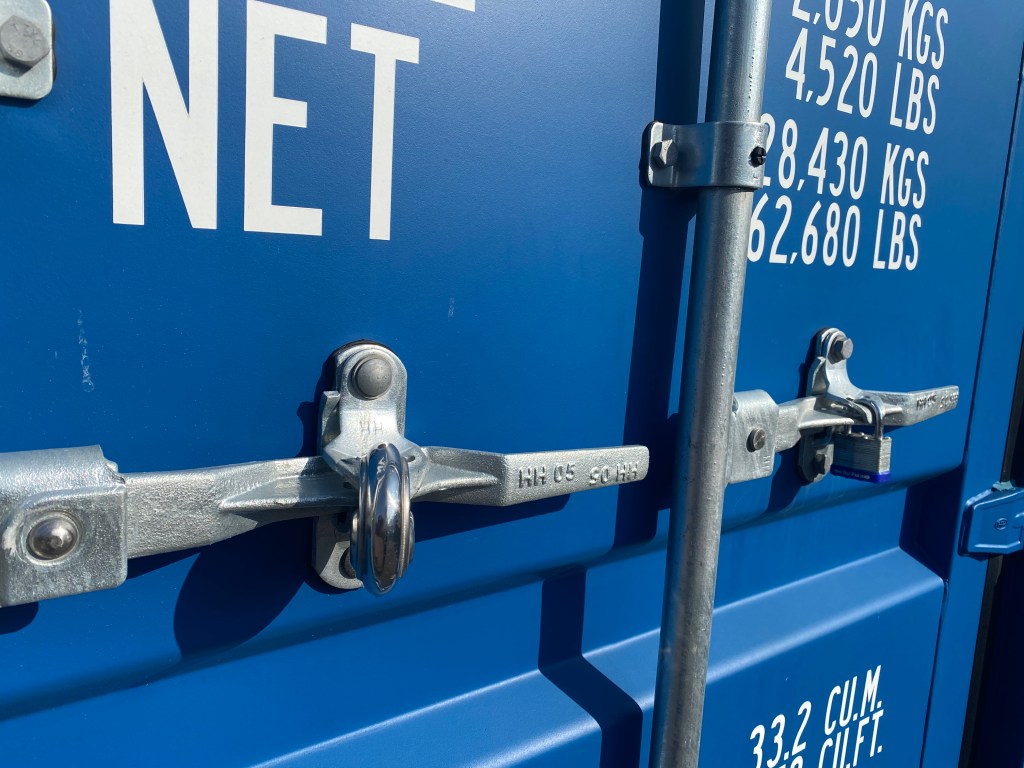 front of shipping container showing padlock