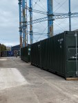 two green container storage units