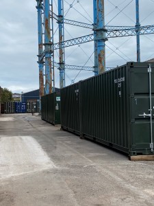 two green container storage units