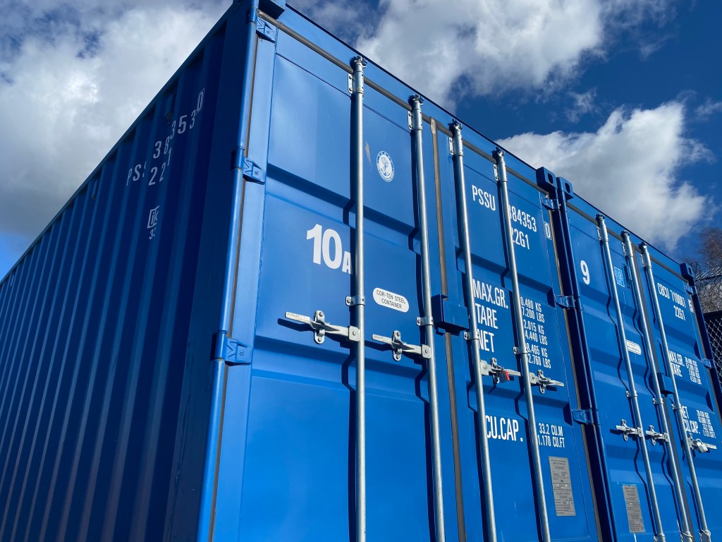 two blue shipping containers