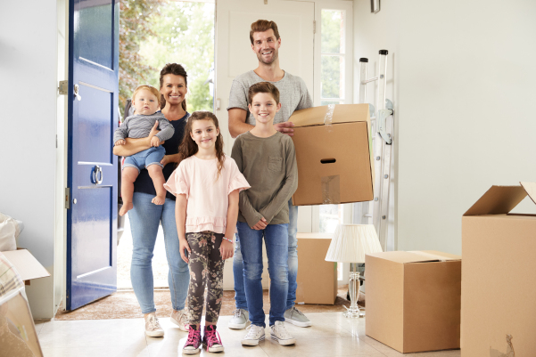 happy family moving into a new home