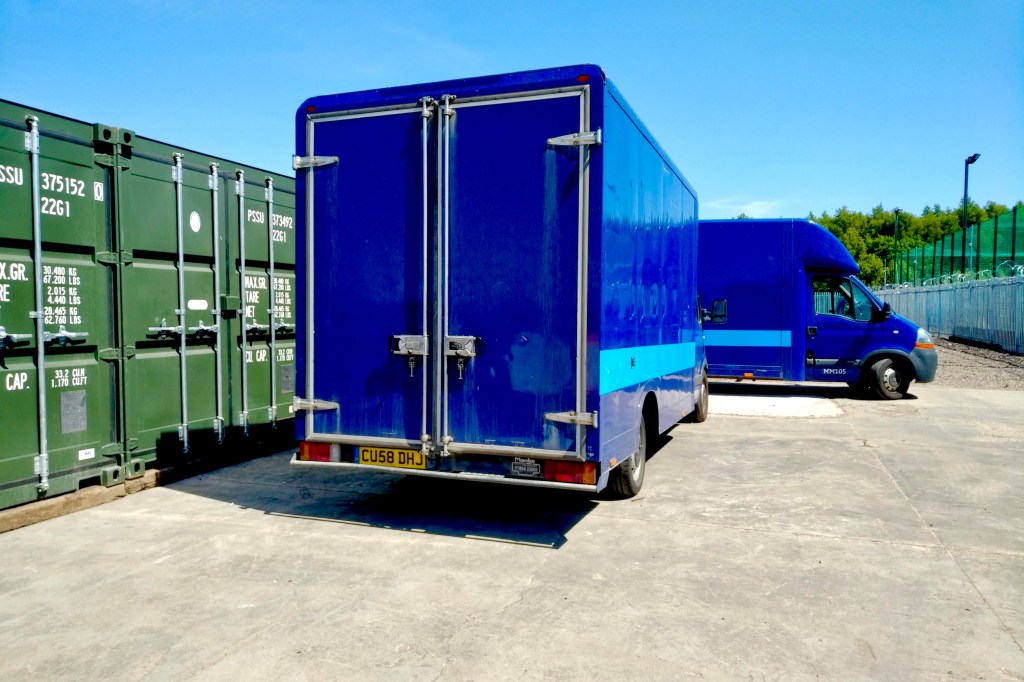 two removal vans at a self storage depot