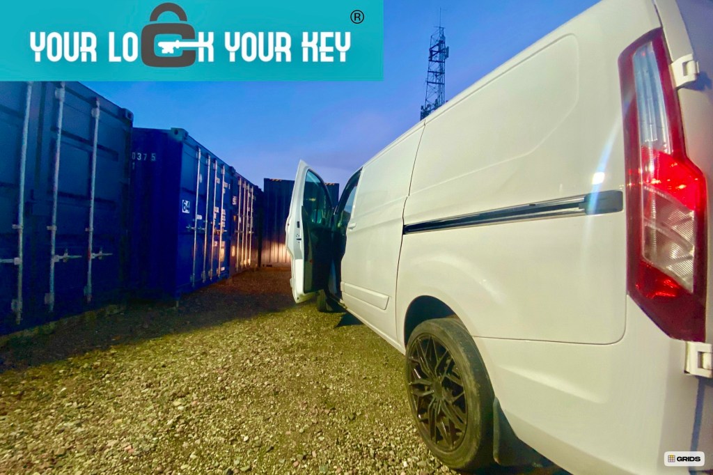van on a your lock your key storage facility beside shipping containers