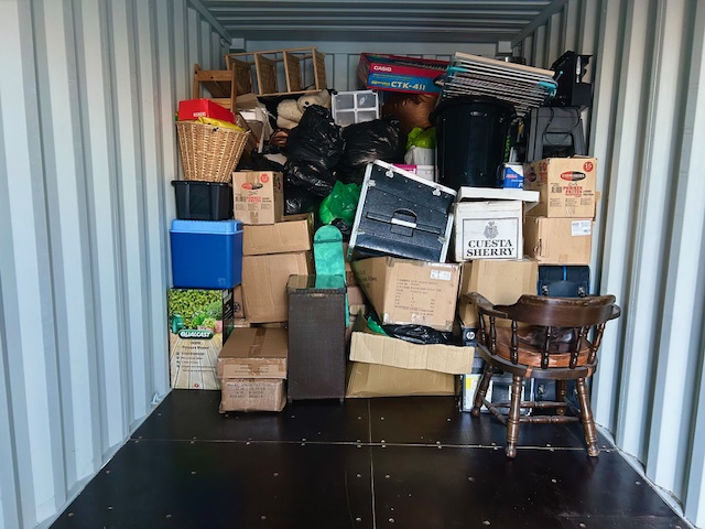 a storage unit full of furniture