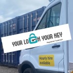 removals van parked next to shipping containers