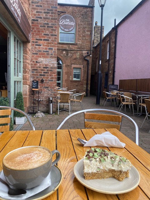 coffee and cake on a table at The Barista café in Wigton, Cumbria