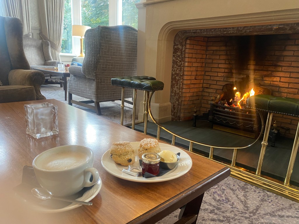 afternoon tea in front of fireplace at the Inn on the Lake, Glenridding, Cumbria