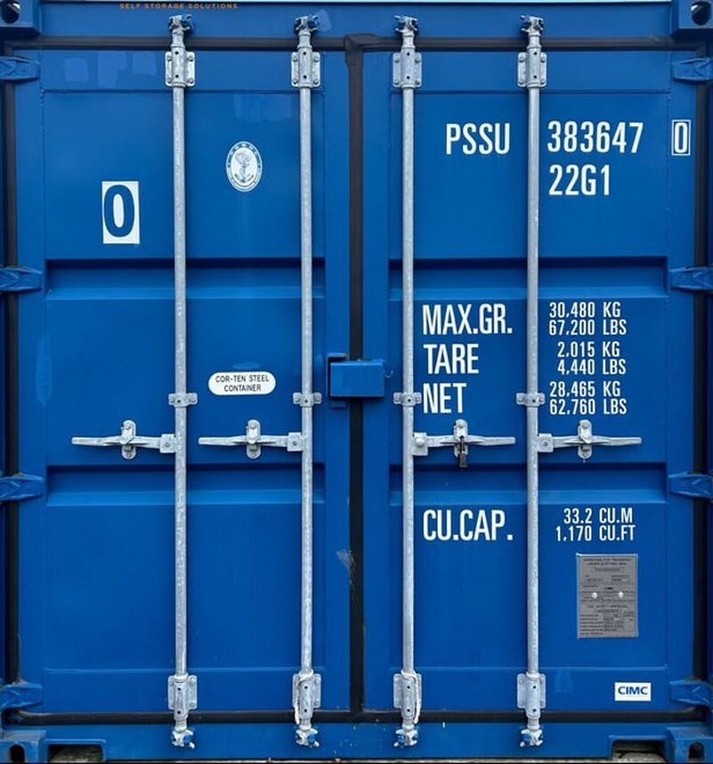 front of a blue one trip shipping container used for storage
