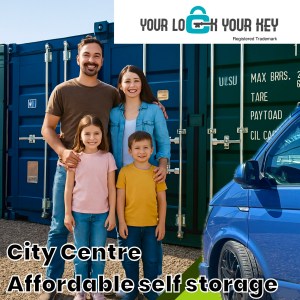 happy family stood infront of a shipping container and beside their van