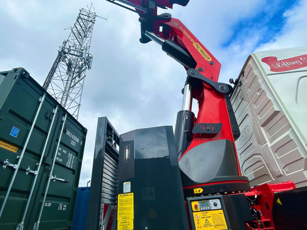 A HIAB delivering a shipping container