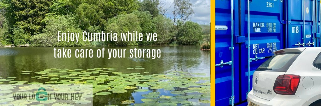A scenic picture of a lake along side a self storage unit depicting tranquillity.