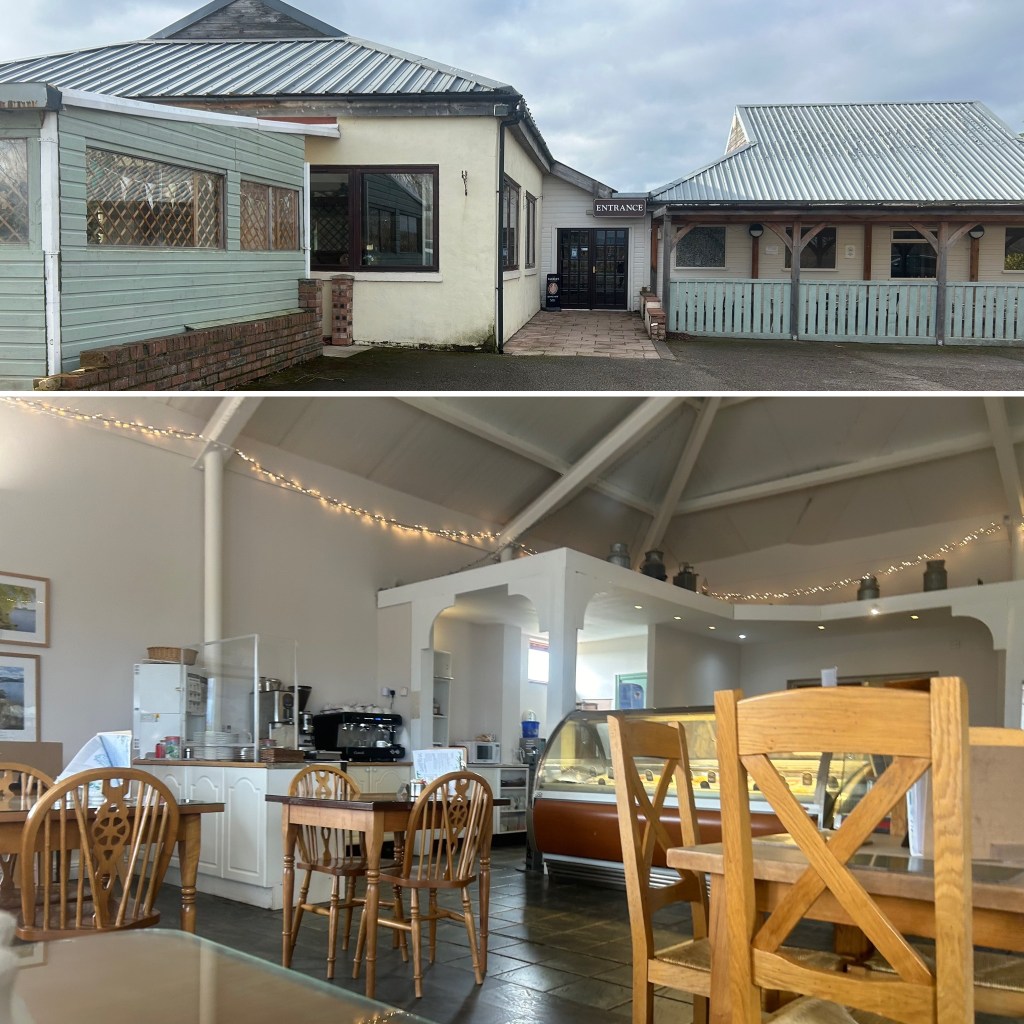 Exterior view of a building with a sign indicating the entrance, featuring a mix of modern and traditional architecture.