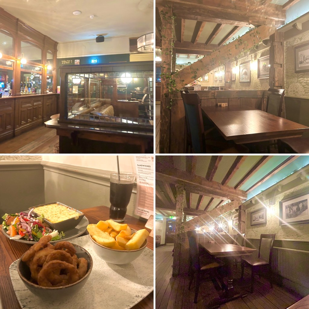 Interior of the Agricultural Inn, Cumbria showing food on a plate and the general interior of the premises.