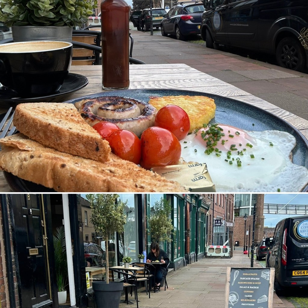 an English breakfast on a table on a table by the pavement outside Foxes Café in Carlisle, Cumbria